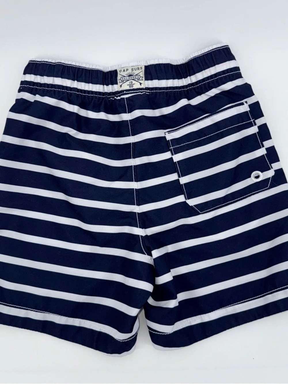 GAP Kids Navy and White Striped Boys Swim Trunks with Orange Drawstring
